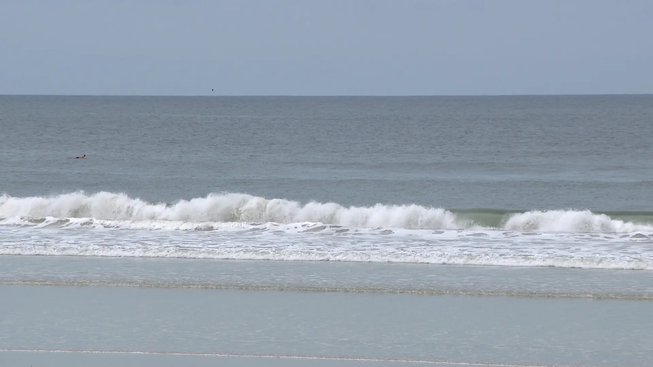 Florida Surfer, 72, Rescues Father and Son from Rip Current