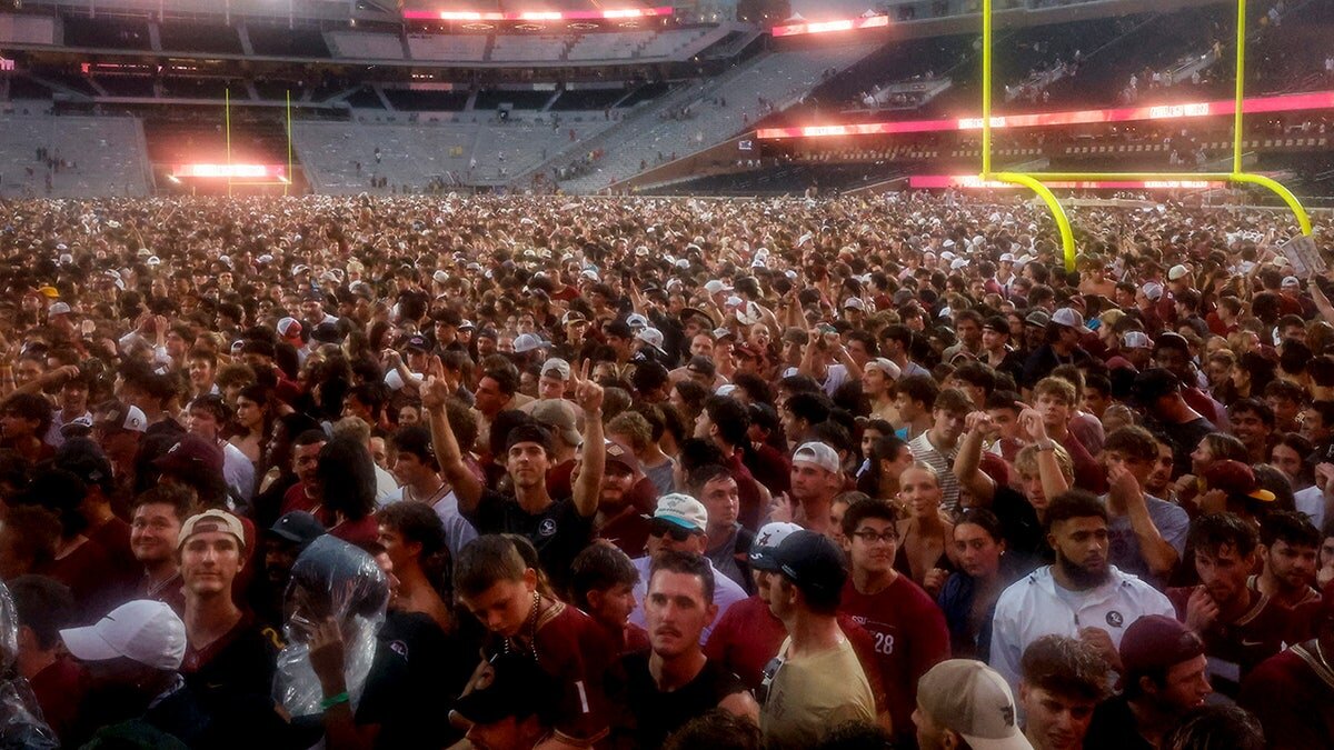 Florida State Fans Storm Field After Upset Win Over Alabama