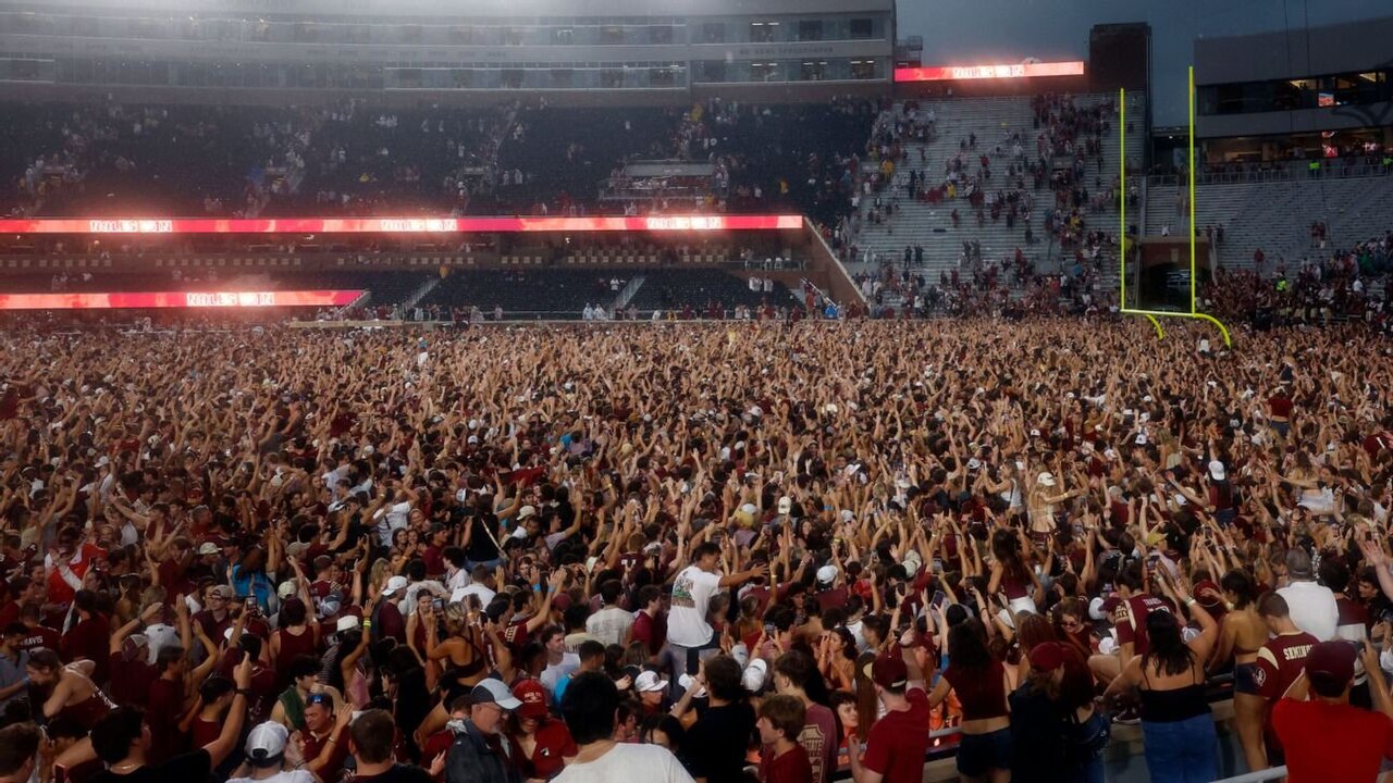 Florida State Fans Storm Field After Win Over Alabama