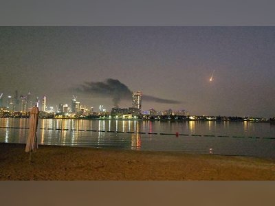 Missile Debris Sparks Fires at Dubai’s Jebel Ali Port Near Palm Jumeirah