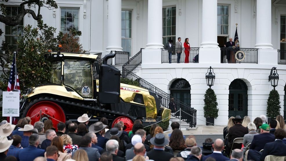 Trump Draws Attention at Event After Admiring Striking Gold Tractor Display