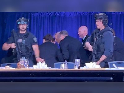 Gunfire at Washington correspondents’ dinner triggers evacuation of Trump and guests as suspect is detained